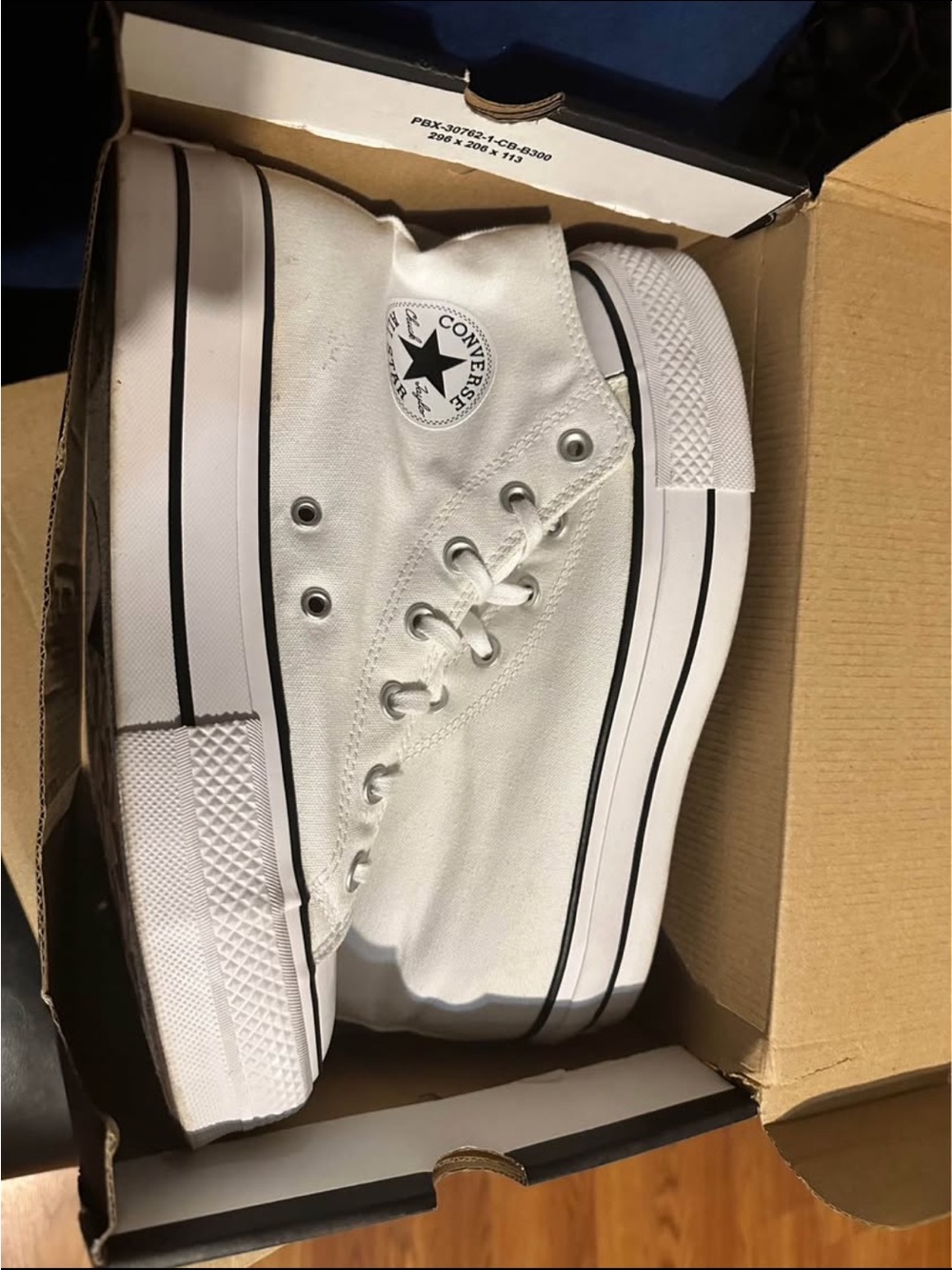 Converse White High-Top Platform Sneakers with Black Trim